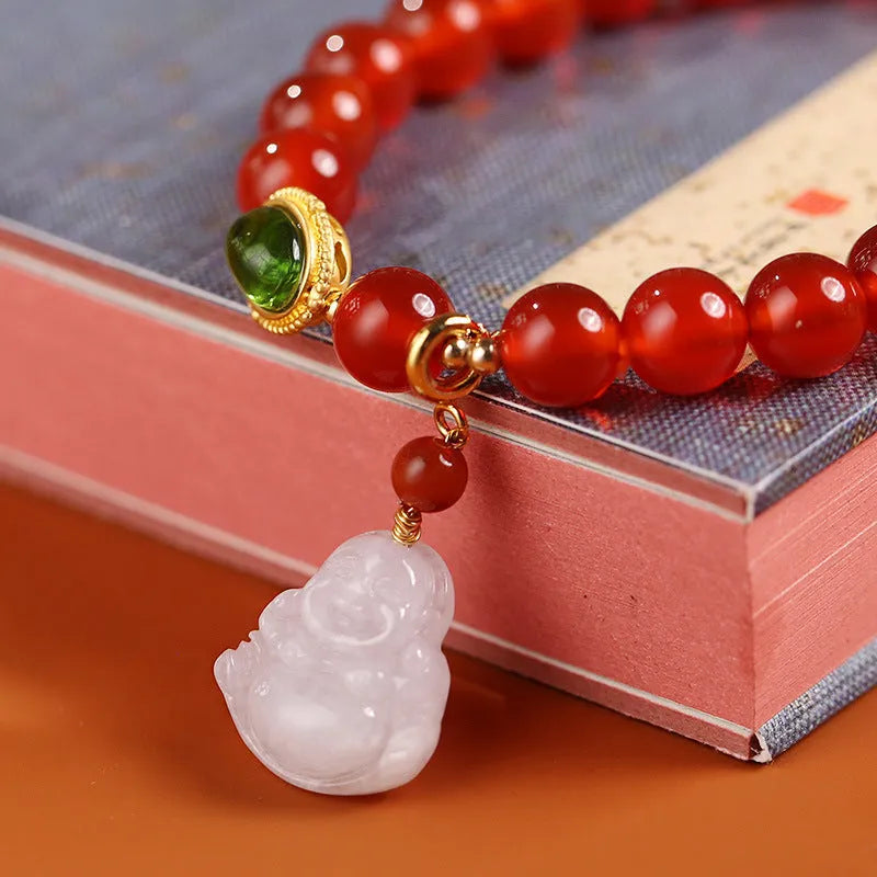 Red agate and amber women's bracelet with geometric Chinese design and hanging Maitreya Buddha charm
