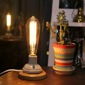Retro ceramic table lamp with a wooden base and glass shade in American Country style.