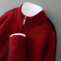 Slim-fit half-zip sheep wool sweater in raw velvet camel colour on a hanger.