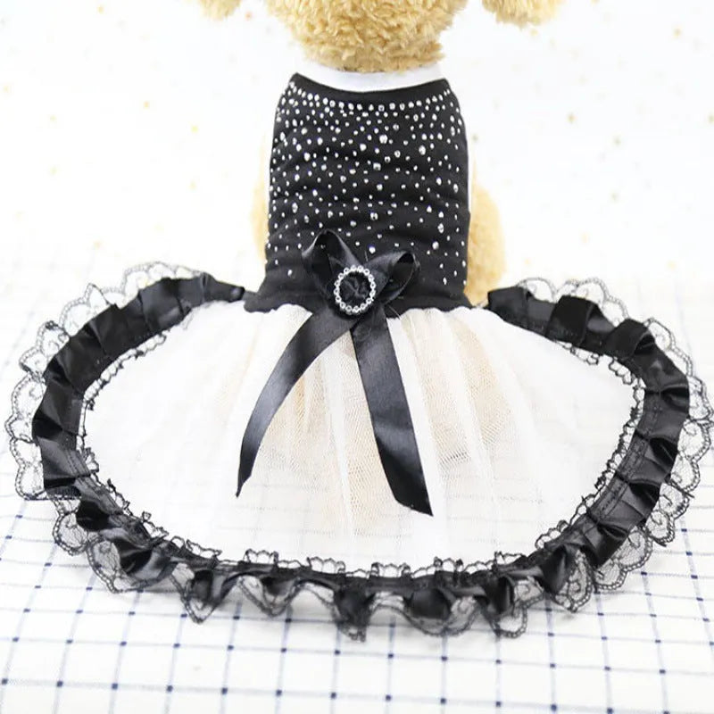 Black spring summer dog clothing in vinylon, sizes XS to L, with bust and back length size chart