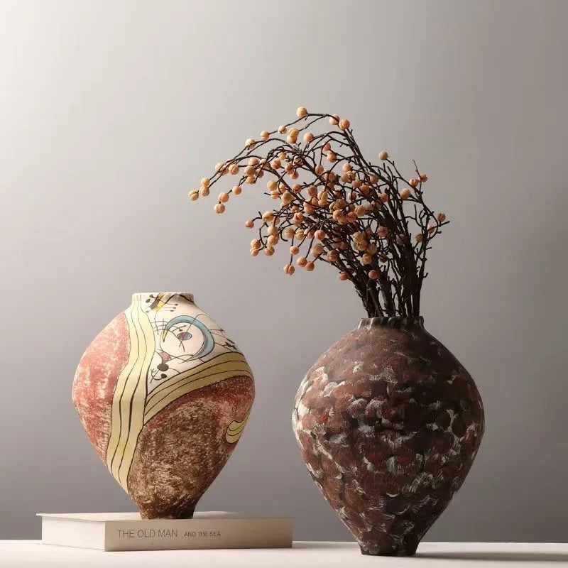 White ceramic decorative vase with hand-painted finish in modern simplicity style for tabletop display