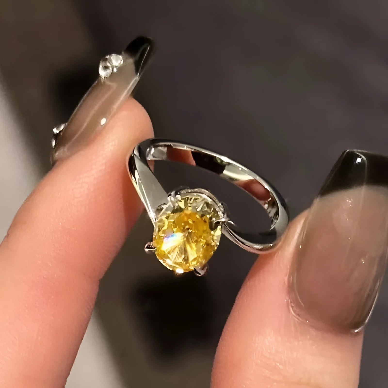 Yellow rock sugar crystal women's ring in polished copper on a hand