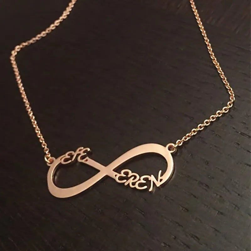 Custom infinity pendant name necklace in gold stainless steel with engraved names