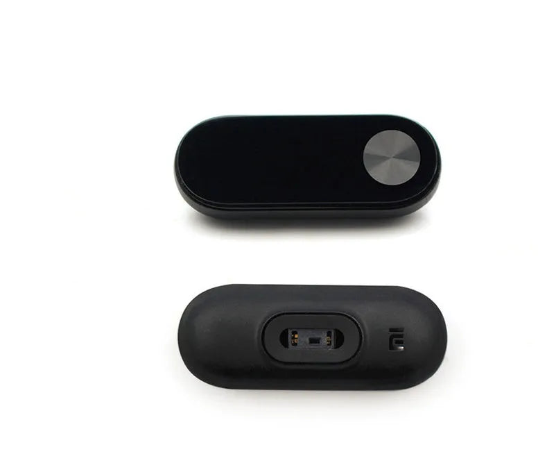 Xiaomi Mi Band 2 black fitness band with OLED screen on an adjustable wrist strap.