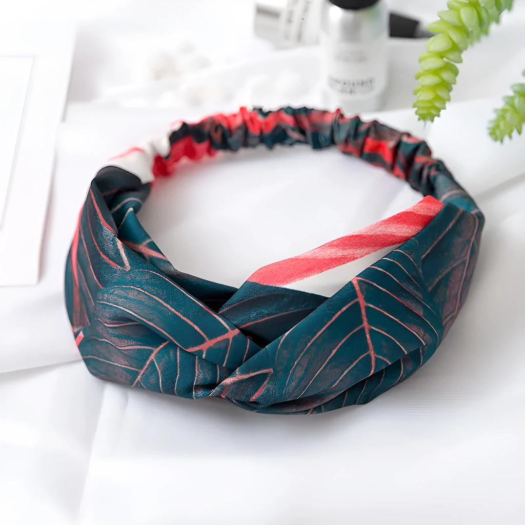 Red cloth headband with embroidered banana leaf cross pattern for women's festival wear