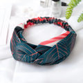 Red cloth headband with embroidered banana leaf cross pattern for women's festival wear