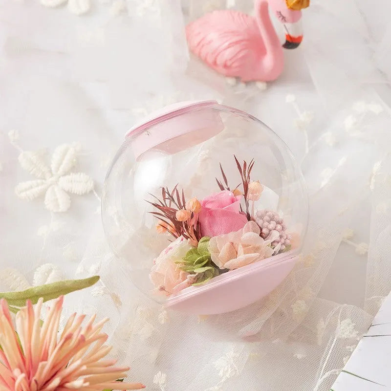 Pink preserved rose decorative ornament with optional base and Bluetooth audio functionality