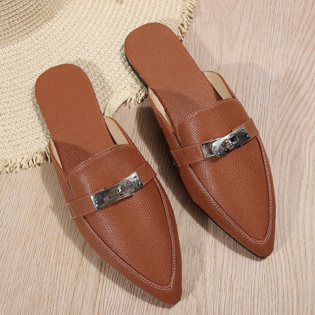 Light brown women's pointed-toe semi-slippers with a low heel and rubber sole on a white background.