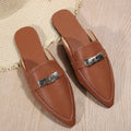 Light brown women's pointed-toe semi-slippers with a low heel and rubber sole on a white background.