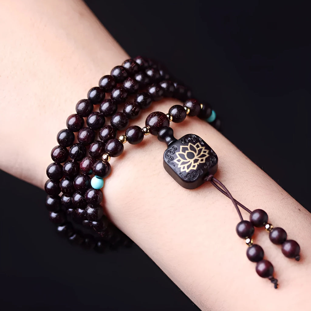 Zambia Rosewood 108-bead bracelet with flat lotus pendant on neutral background