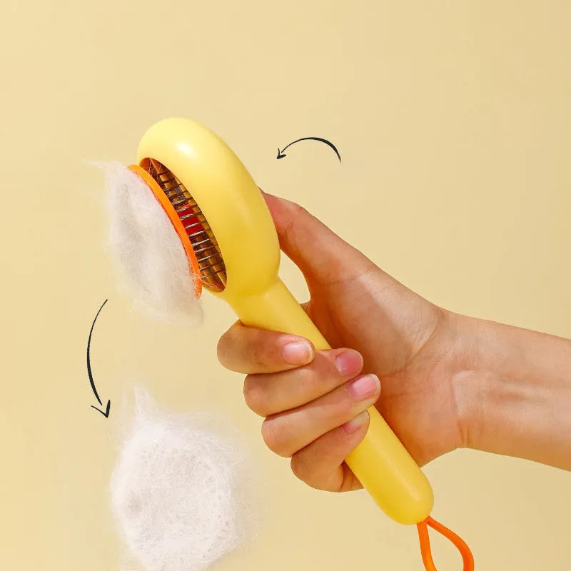 Small yellow duck comb with needle pins for pet hair removal on cats and dogs