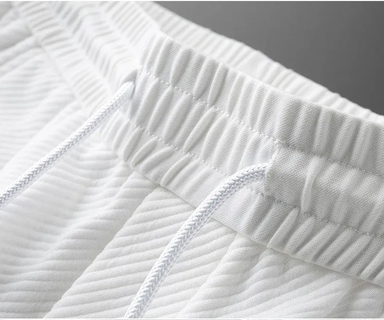 Men's twill stretch trousers in white, cotton blend fabric, casual fit, available in sizes M to 4XL
