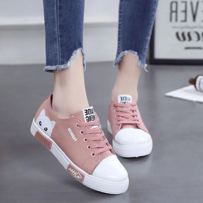 Cat fish canvas shoes with breathable canvas upper and lace-up closure, available in pink, black, and white