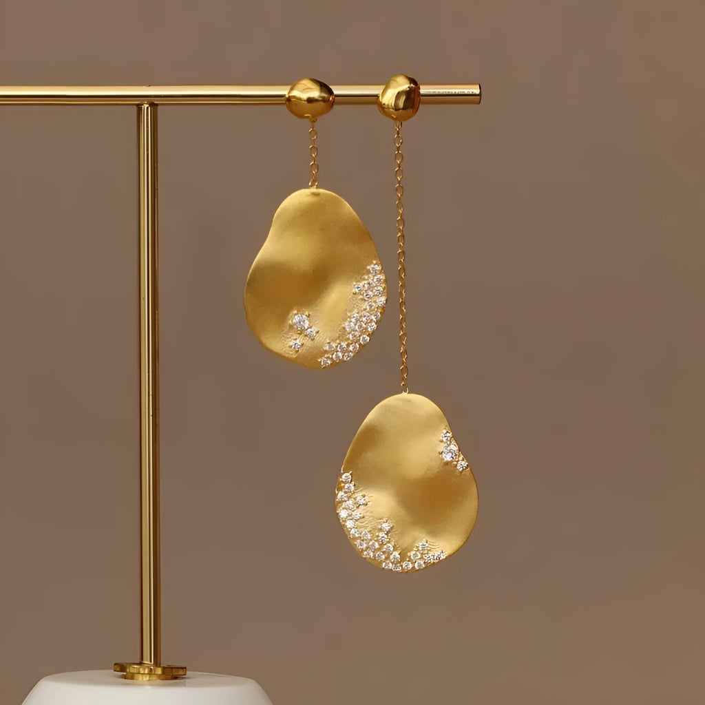Asymmetric floral earrings with Chinese style design featuring zircon mosaic accents on gold-plated materials