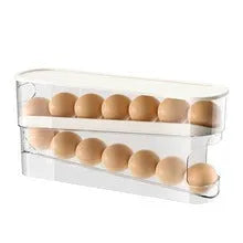 White plastic slide-out egg tray with automatic dispenser on a kitchen countertop