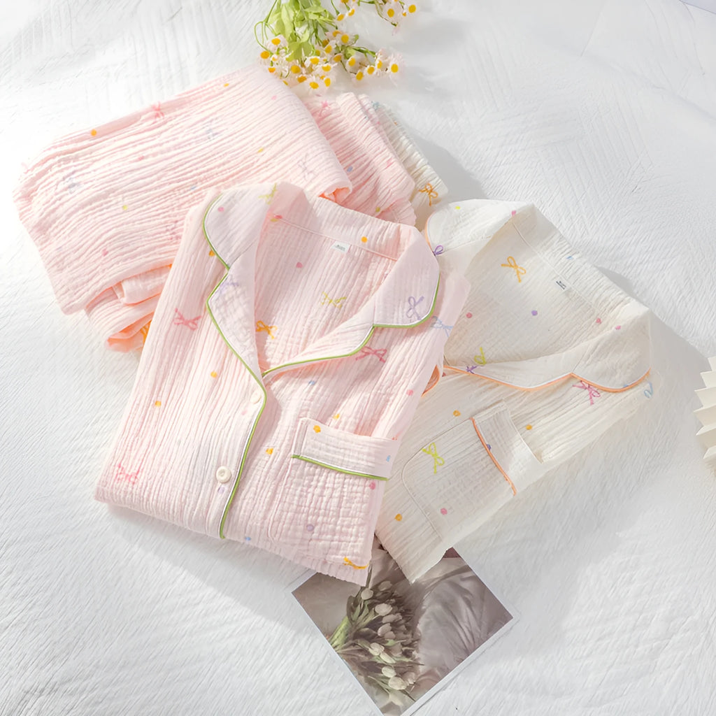 Women's cotton pajama set in pink or beige with long sleeves and trousers