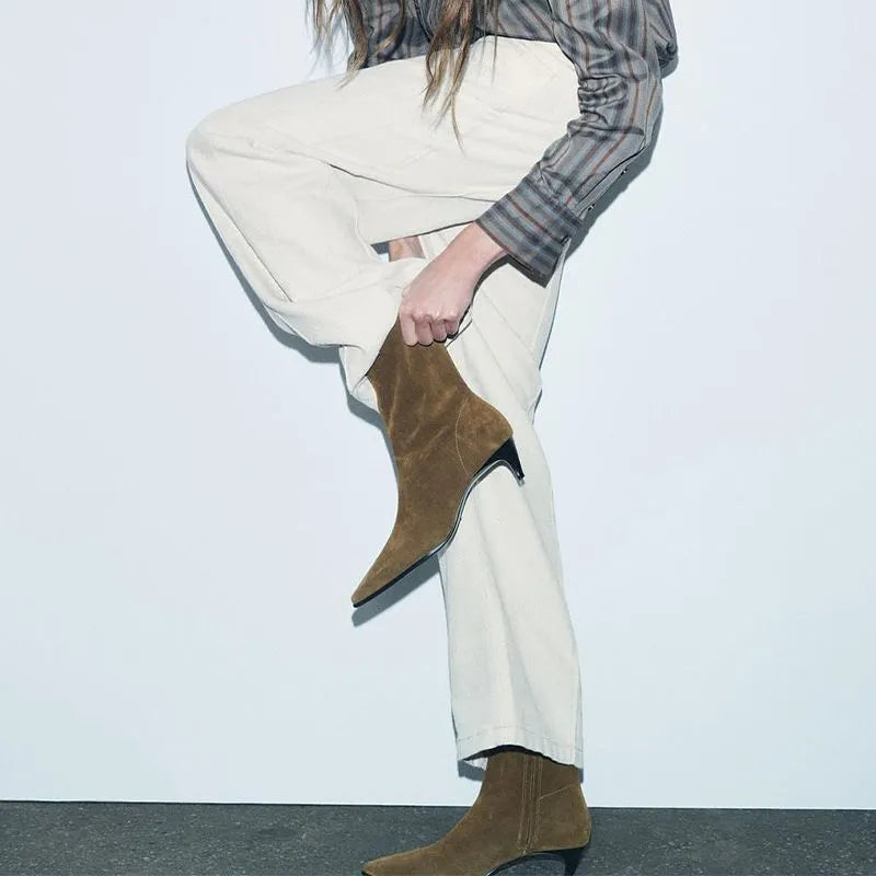 Brown square toe mid-heel ankle boot with side zipper and waterproof platform sole.