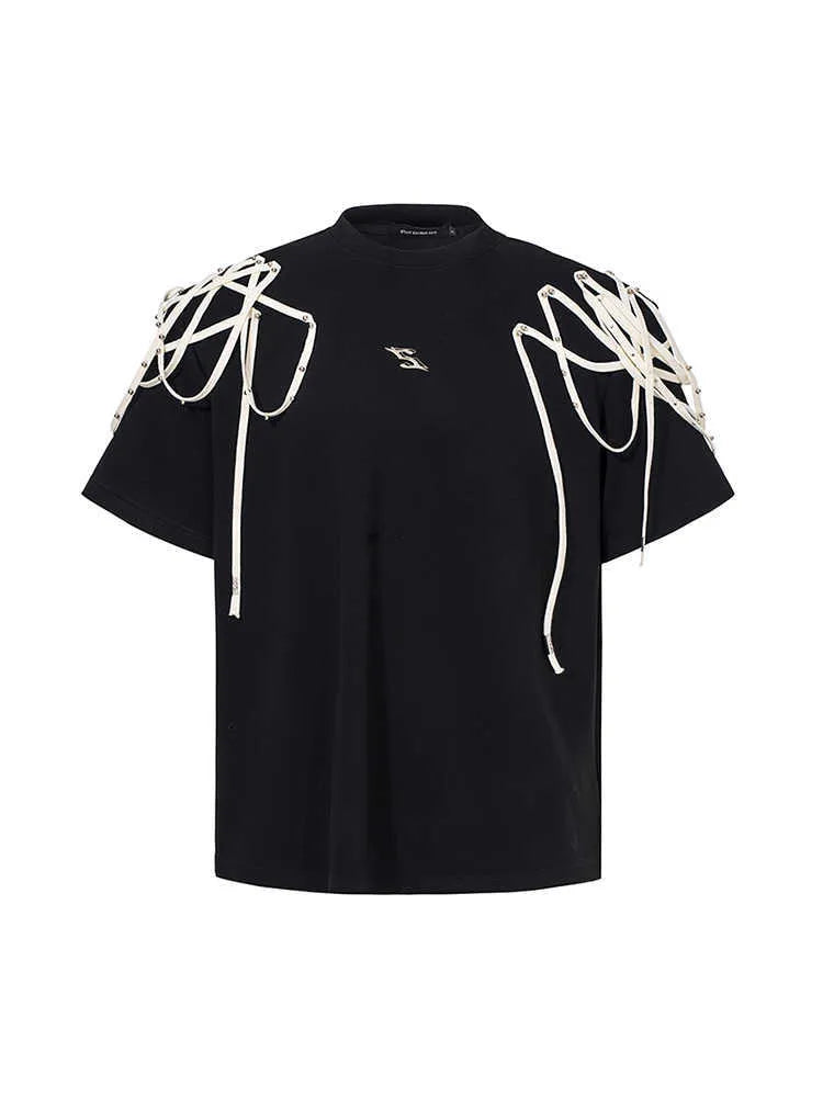 Black loose fit short sleeve t-shirt with padded shoulders and decorative rivet ribbon detail.