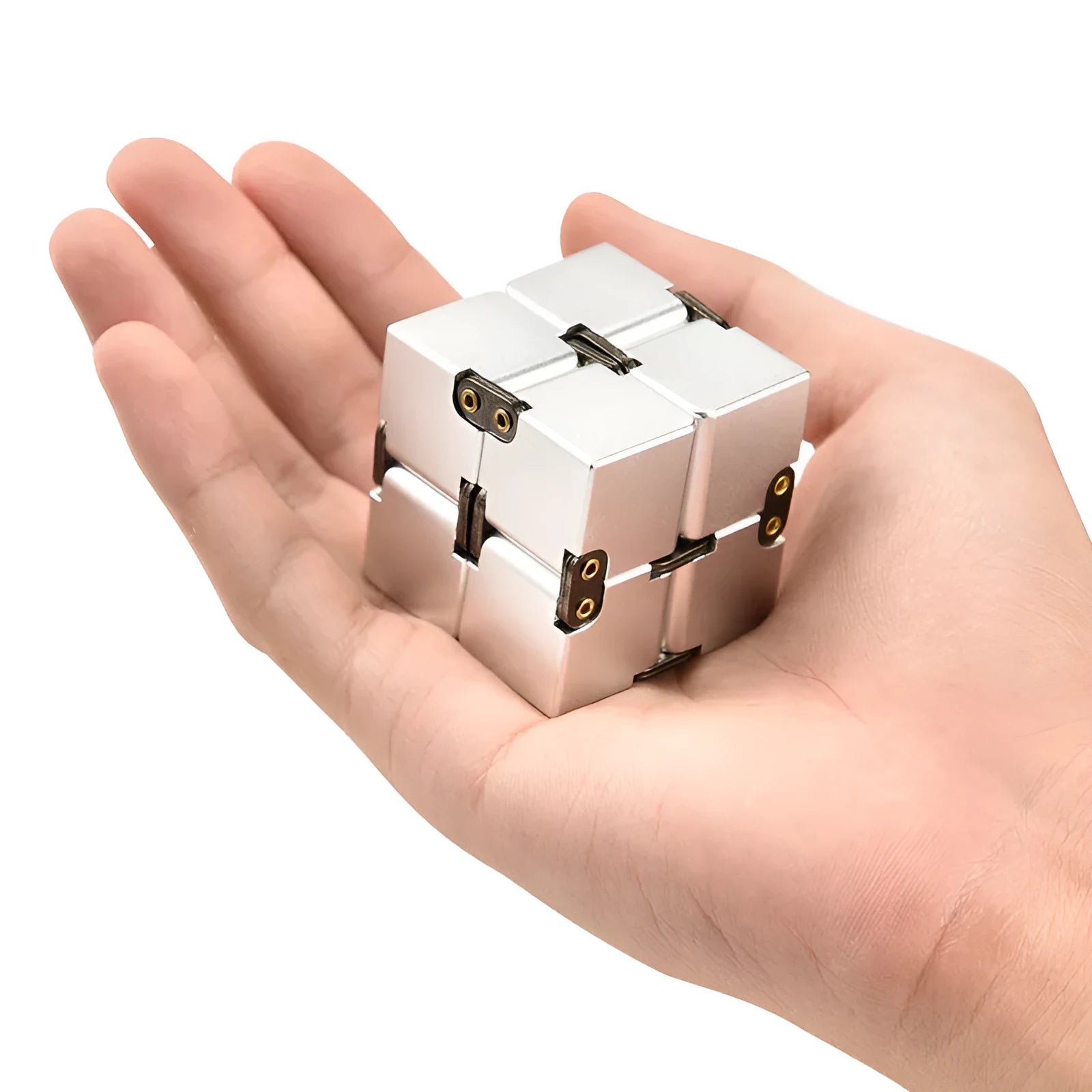 Zinc alloy infinity cube fidget toy showing black and silver rotating cube puzzle on a desk.