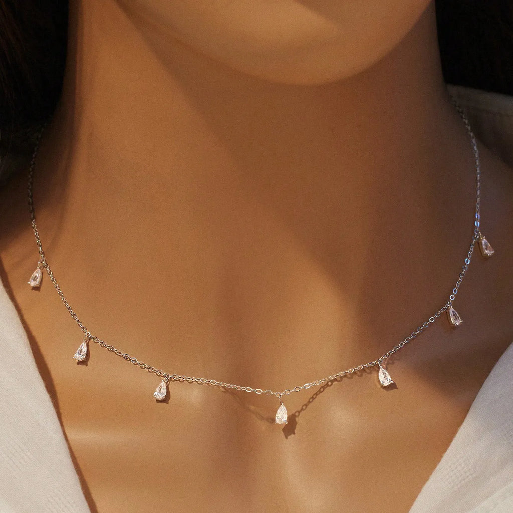 Drop-shaped artificial zircon necklace on an adjustable O-chain in silver, rose gold, or golden yellow finish.