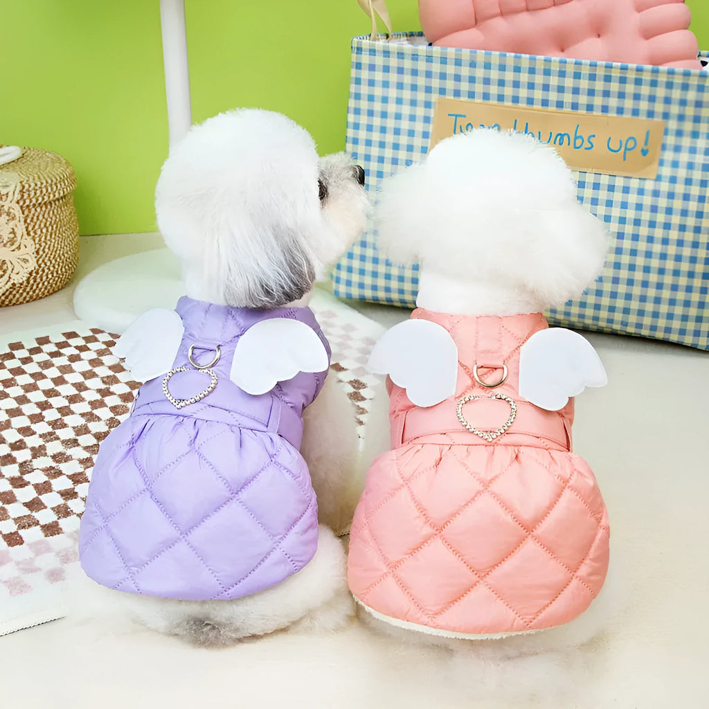 Small dog wearing pink thickened cotton skirt with casual angel-style design
