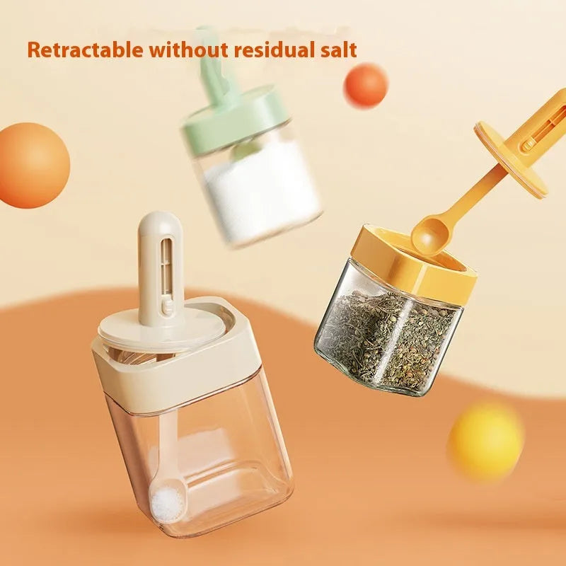 Yellow retractable glass seasoning jar with lid in Nordic style on kitchen counter