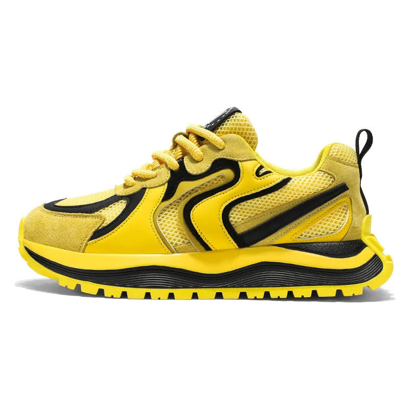 Men's yellow casual sneakers with mesh panels, round toe, and rubber sole displayed from side view