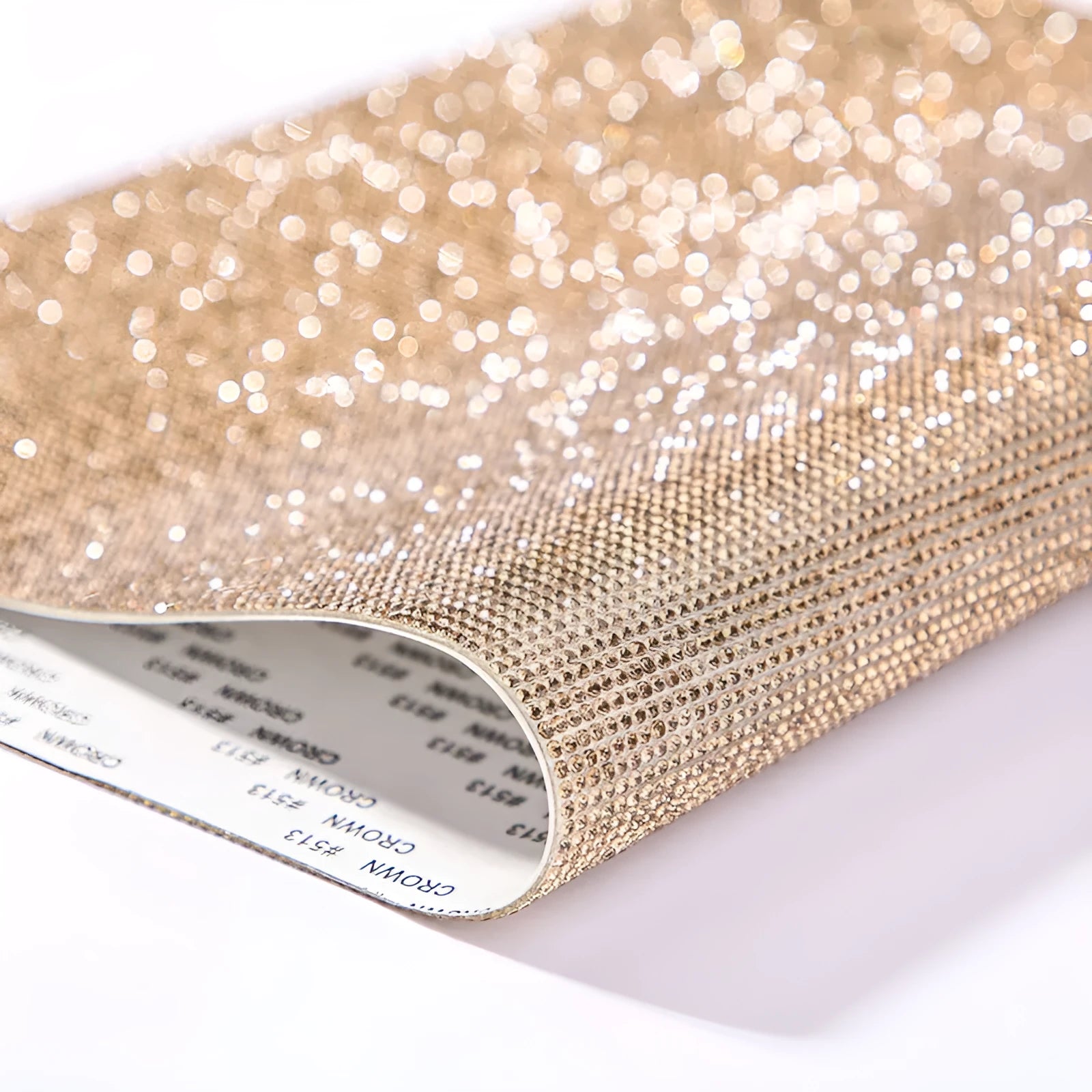 Rhinestone adhesive transfer sheet in eight-eyes pattern for hot drill application