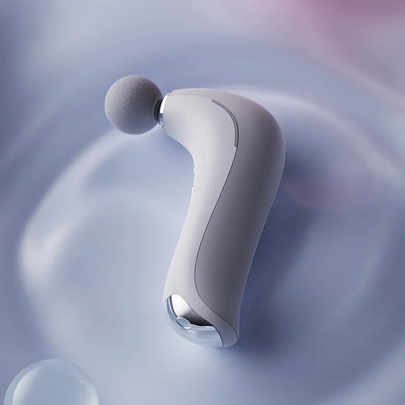 Mini electric massage gun with three heads in pink, star grey, and white, USB rechargeable