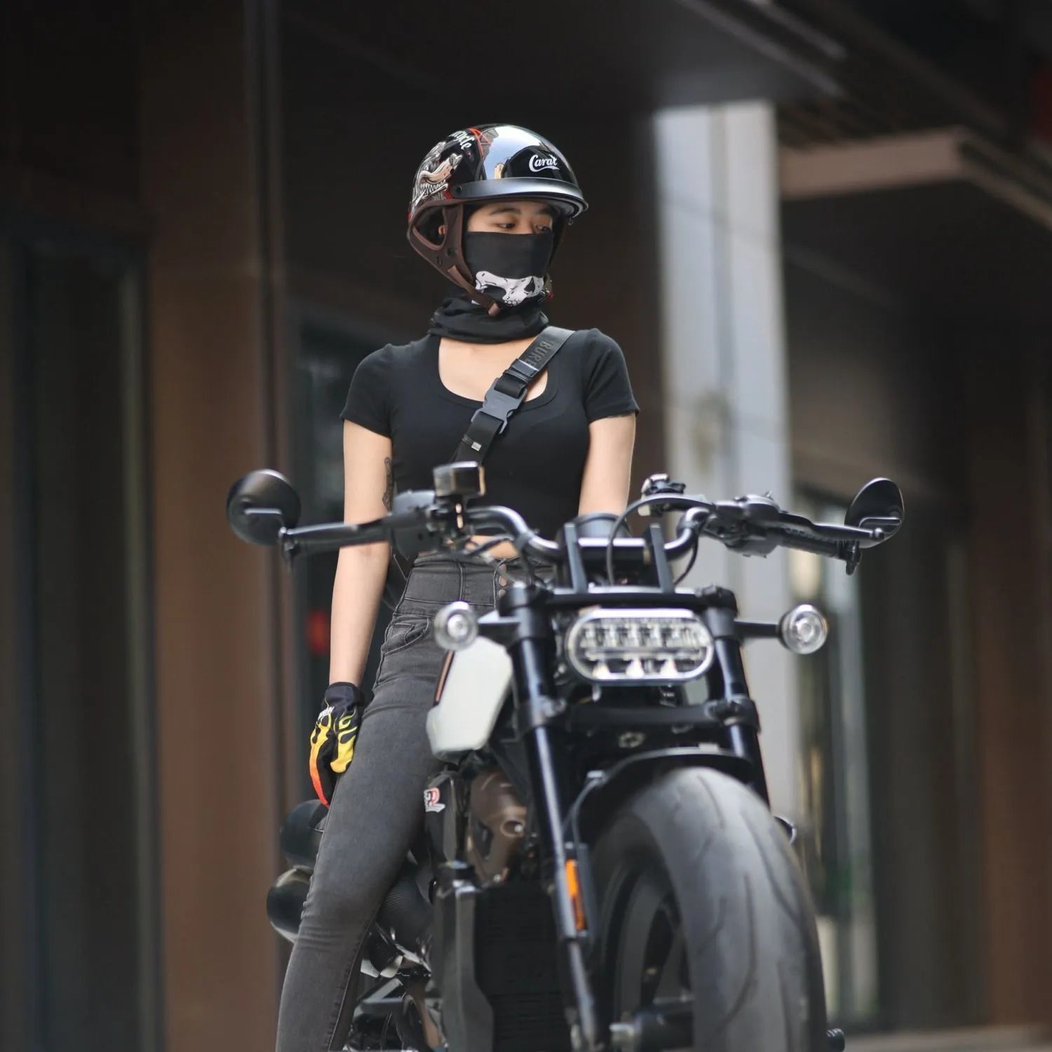 Retro full-face electric motorcycle helmet in black flywheel colour, side view
