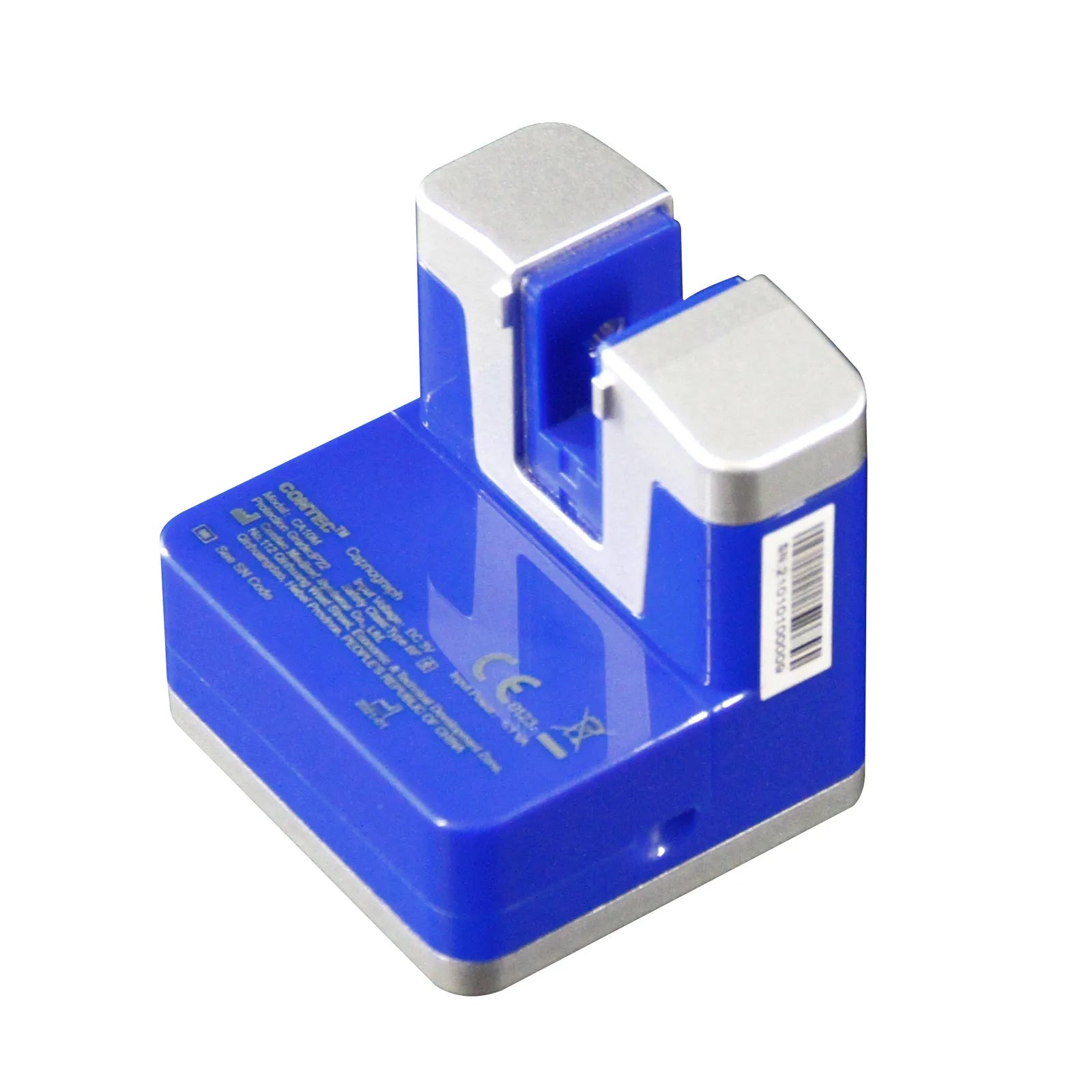 Veterinary CA10M mainstream CO2 capnograph monitor with display, air adapter, and AAA batteries in a handheld design