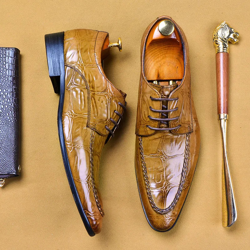 Men's black leather business shoes with alligator pattern texture and a gold horse bit buckle.
