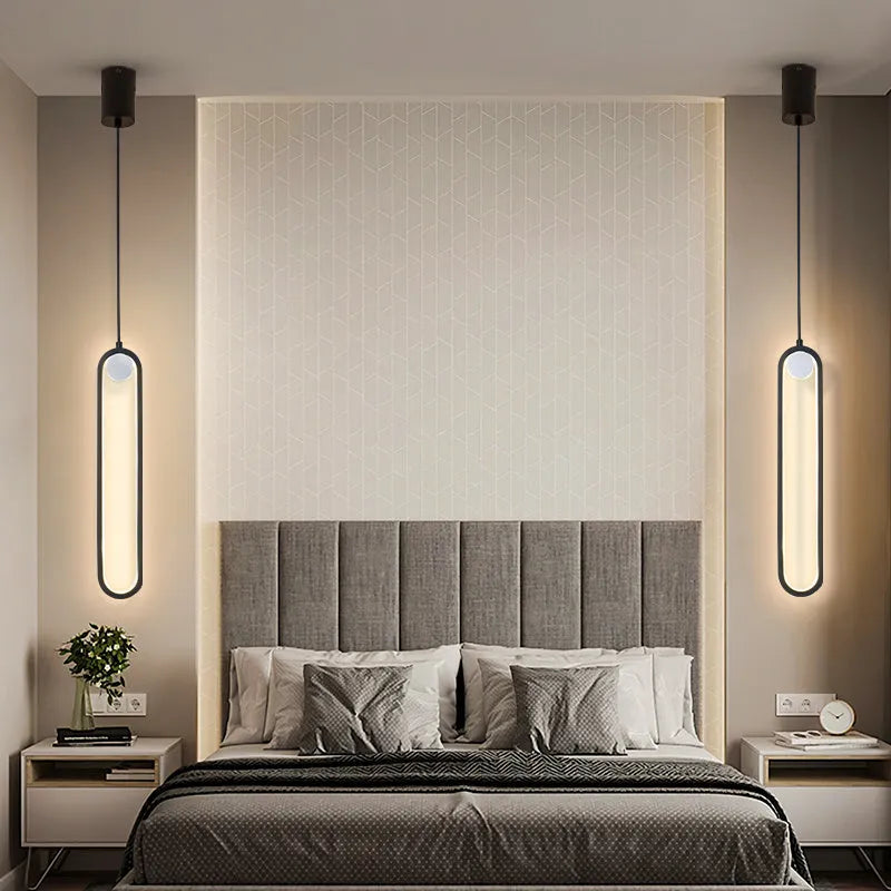 Nordic minimalist oval bedside chandelier in Black A finish showing LED tri-colour ceiling light with aluminium alloy body