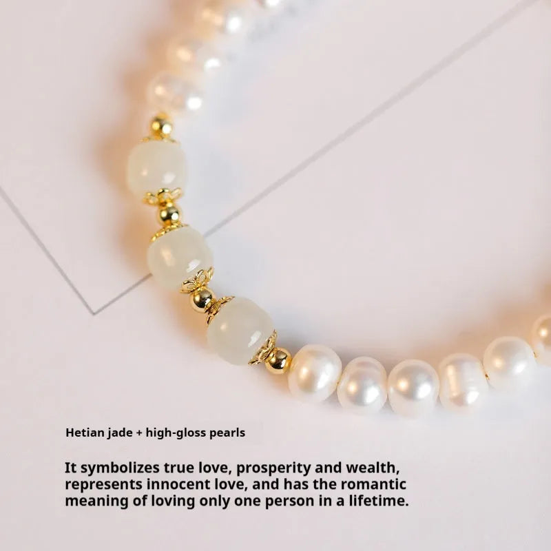 Korean style diamond-shaped freshwater pearl bracelet in Hetian jade colour on a white background.