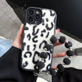 Leopard printed plush silicone iPhone case with chain and bracelet in brown, black or beige