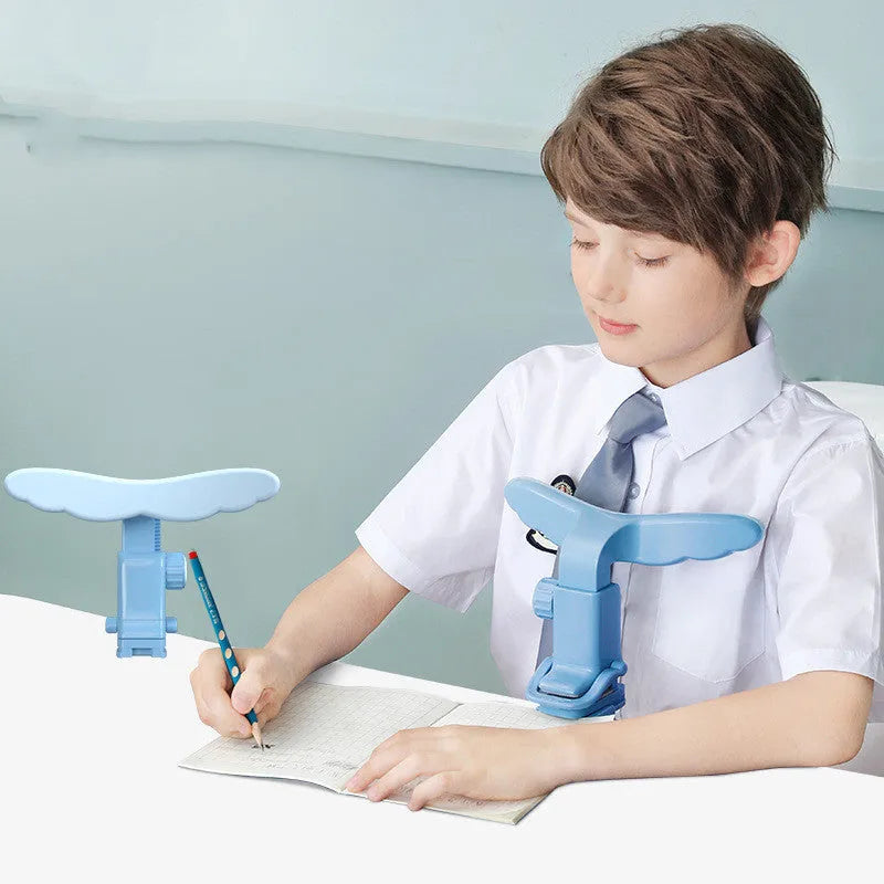 Student anti-myopia seated orthosis in blue on a desk, made from silicone and ABS material