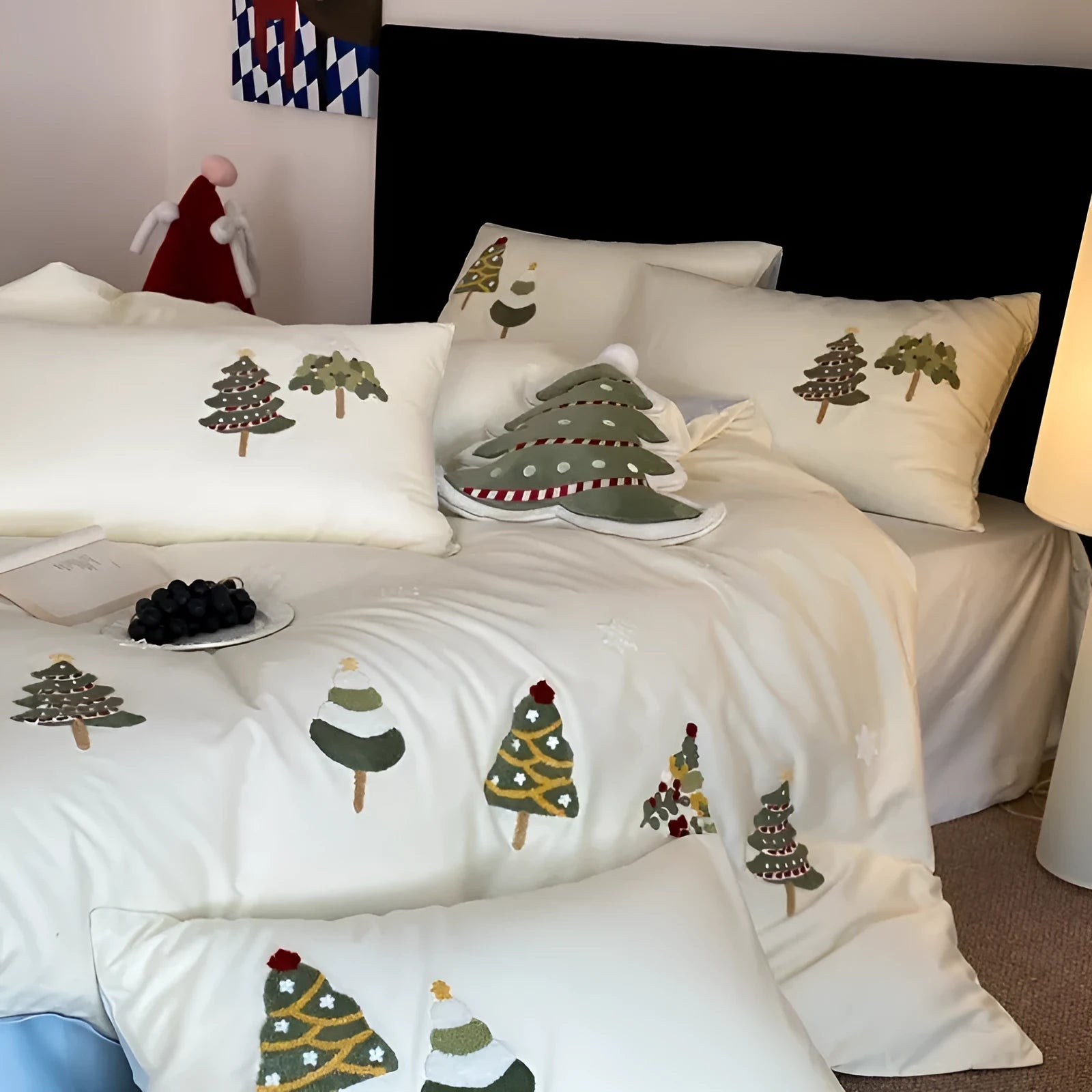 Cream blue duvet cover with raised towel embroidery of Christmas trees and flowers, part of a four-piece pure cotton bedding set.