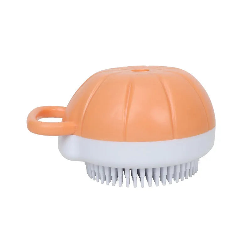 Orange TPR dog shampoo brush with silicone comb teeth and pumpkin-shaped ergonomic handle