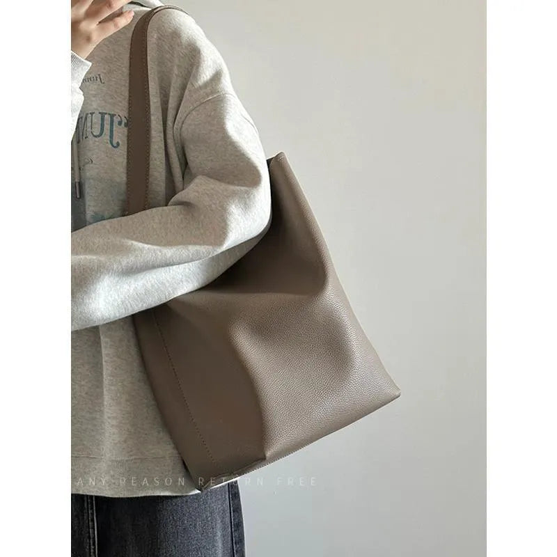 Large capacity black PU bucket shoulder tote bag with sewing thread detail