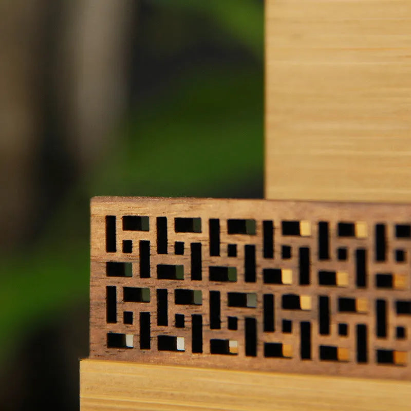 Geometric business gift set in bamboo and black walnut, 35 mm thick, holding up to 80 items for corporate events