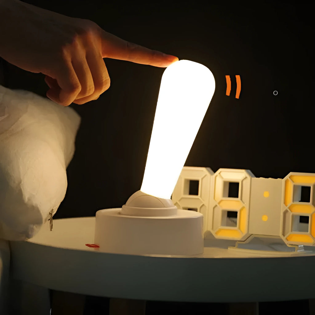 Toggle silicone USB rechargeable night light with warm LED, wall mounted in bedroom