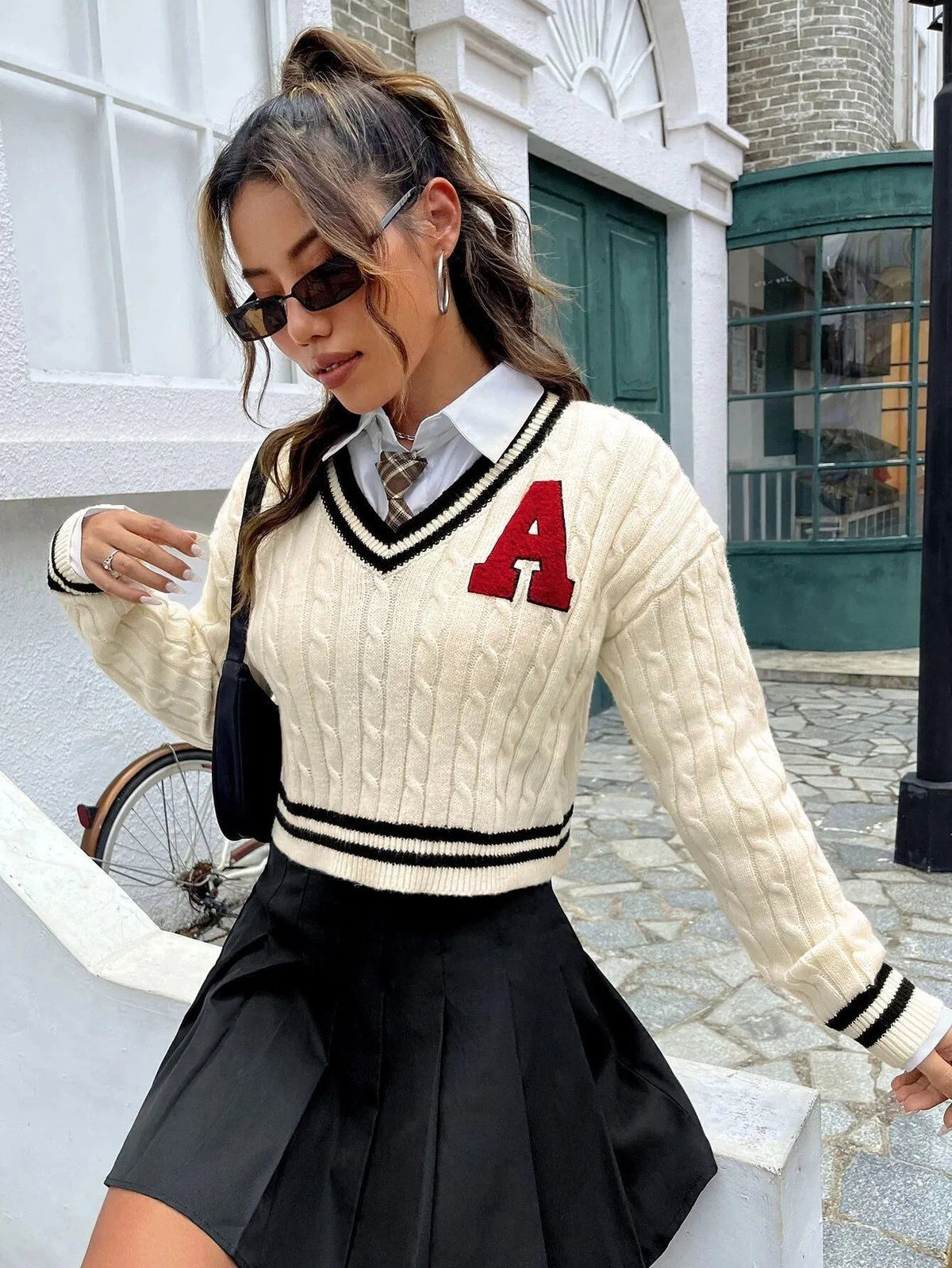 Milky white V-neck striped knitted shirt pullover for women with long sleeves and patch detail
