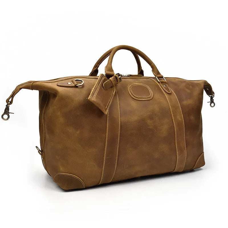 Genuine cowhide leather large capacity luggage bag in light brown with zipper closure and top handles