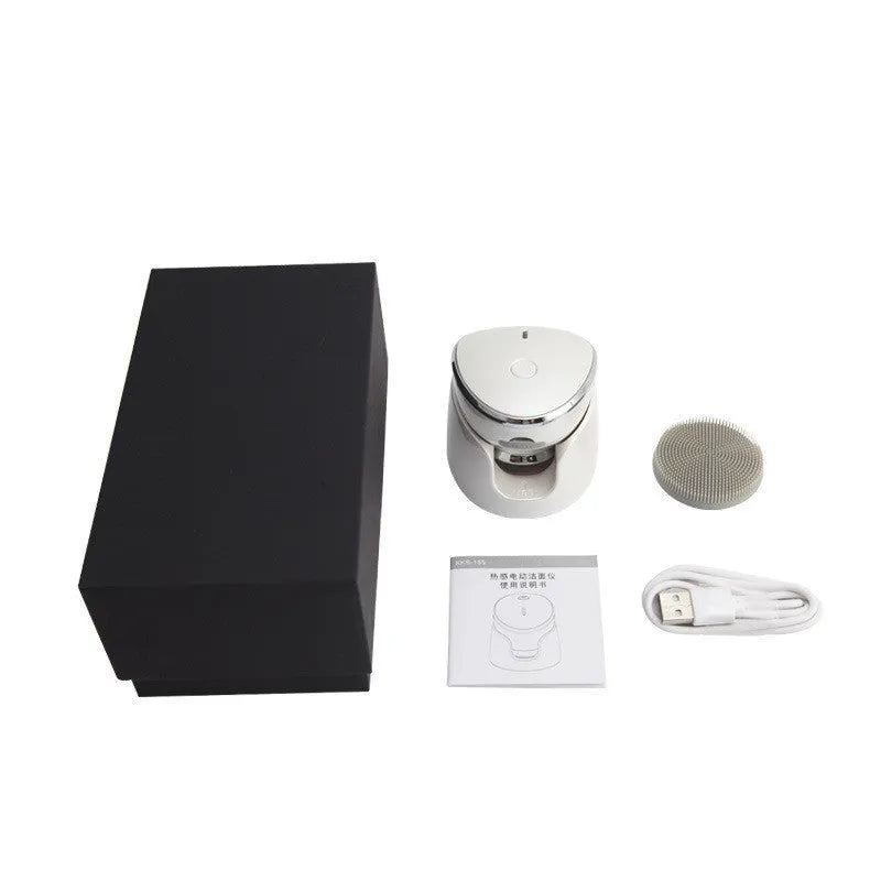 White multifunction USB charging facial cleansing massager with hot egg design, silicone brush head, and 5 vibration modes on a white background