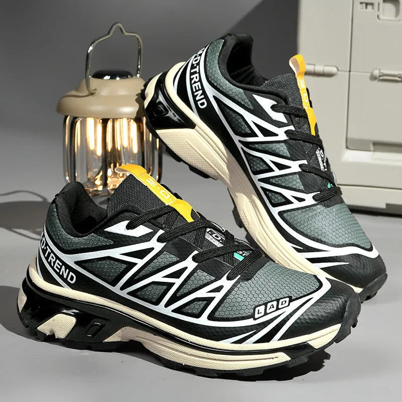 Low-top lace-up hiking shoes in khaki colour with round toe and rubber sole for casual outdoor wear.