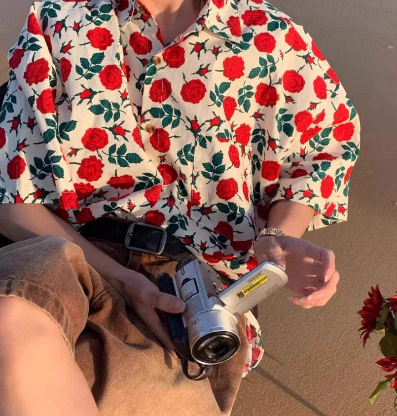 Summer Port retro rose-printed short-sleeved shirt in apricot colour on a model