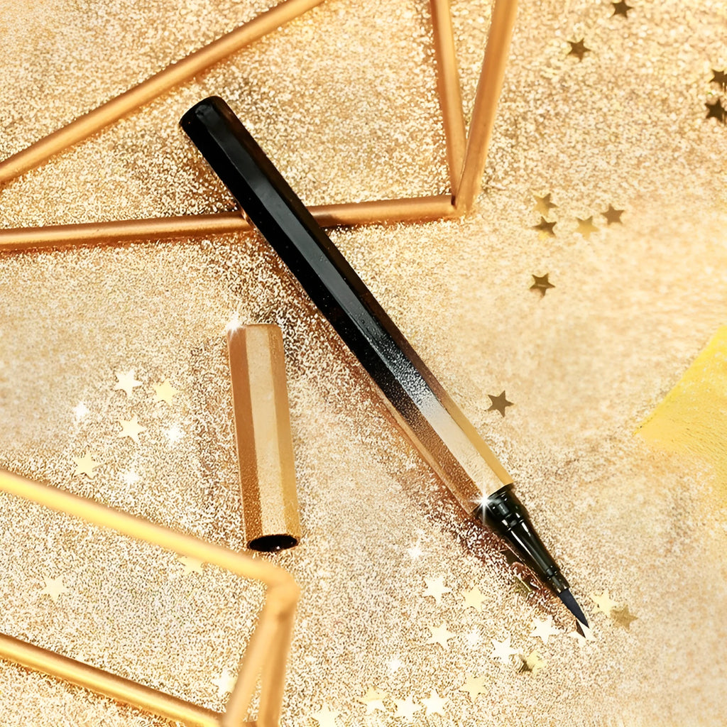 Golden pearlescent liquid eyeliner by Star Series with fine tip applicator, available in Black, Coffee, Gold, and Silver