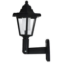 Black hexagonal solar wall light with IP44 waterproof rating for outdoor garden and pathway illumination
