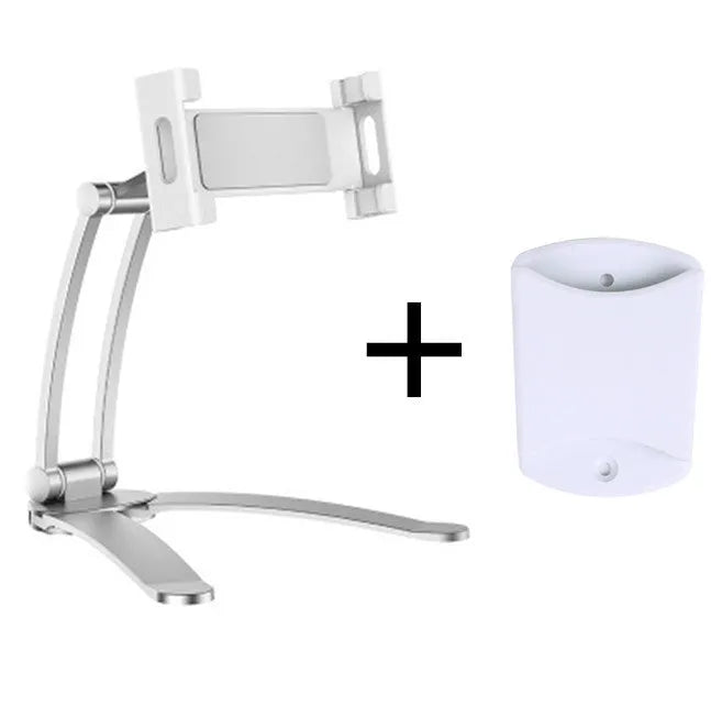 Silver aluminium desktop stand holding a tablet at an angle on a wooden desk.