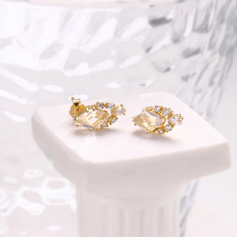 Geometric 925 sterling silver earrings with sweet white crystal accents on electroplated settings